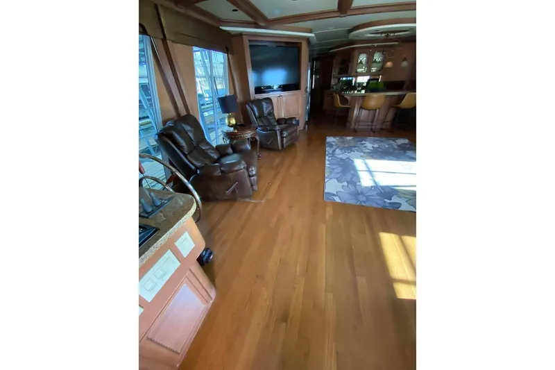 Slide: The Image of Outdoor seating on 2007 Summerset houseboat, overlooking serene lake and marina. - 94