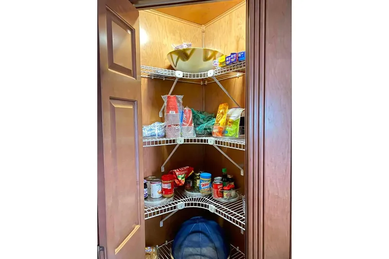 Slide: The Image of Outdoor seating on 2007 Summerset houseboat, overlooking serene water and wooded shoreline. - 95