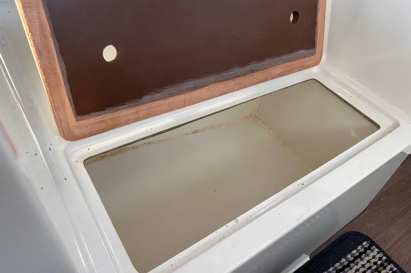 Slide: The Image of Open storage compartment on a 2021 Beneteau Antares 8 boat. - 32