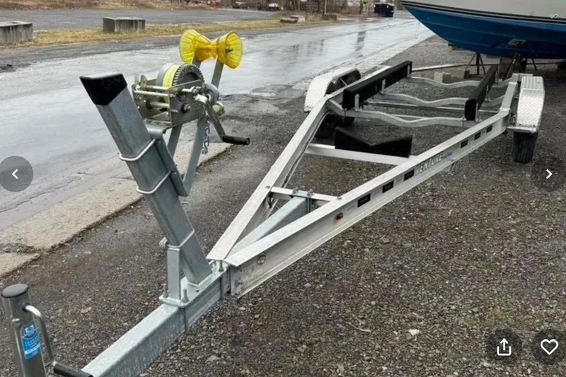 Slide: The Image of Boat trailer for 2021 Beneteau Antares 8 on a wet gravel surface. - 38