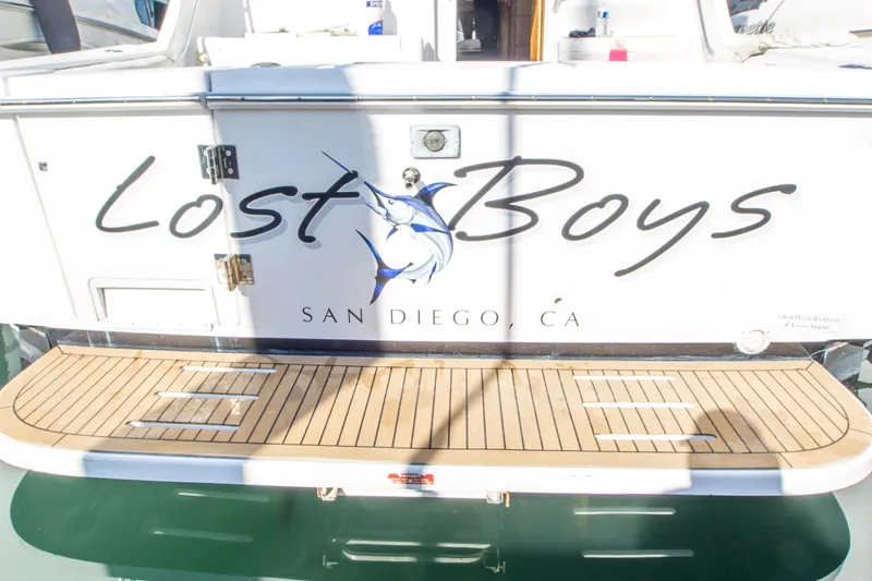 Slide: The Image of 2002 Luhrs 36 Convertible boat named "Lost Boys" docked in San Diego, CA. - 29