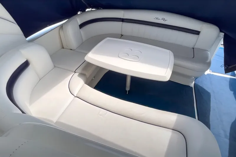 Slide: The Image of 2007 Sea Ray 40 Sundancer interior with white seating and table. - 21