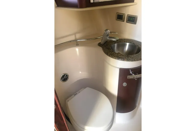 Slide: The Image of Bathroom interior of 2007 Sea Ray 40 Sundancer yacht with sink and toilet. - 30