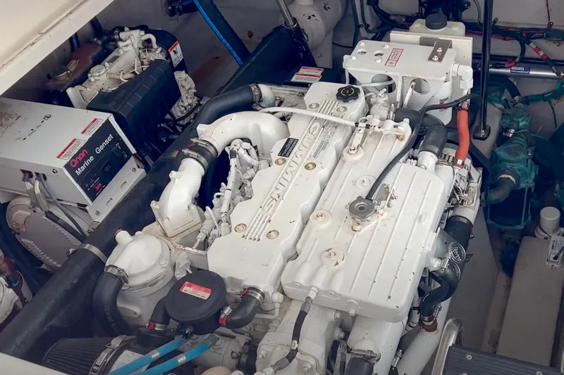 Slide: The Image of Engine room of a 2007 Sea Ray 40 Sundancer with Cummins engine and marine generator. - 35