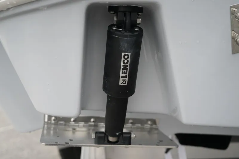 Slide: The Image of 2026 Robalo R232 Explorer boat with Lenco trim tab actuator. - 20