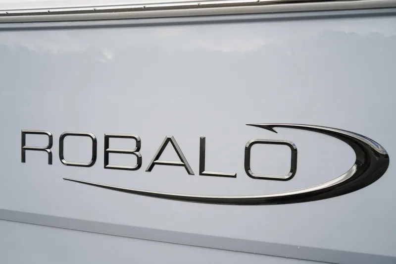 Slide: The Image of Robalo R232 Explorer 2026 logo on a sleek white surface. - 21