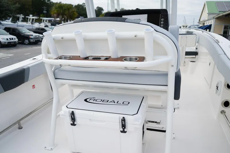 Slide: The Image of 2026 Robalo R232 Explorer boat interior with seating and storage features. - 3