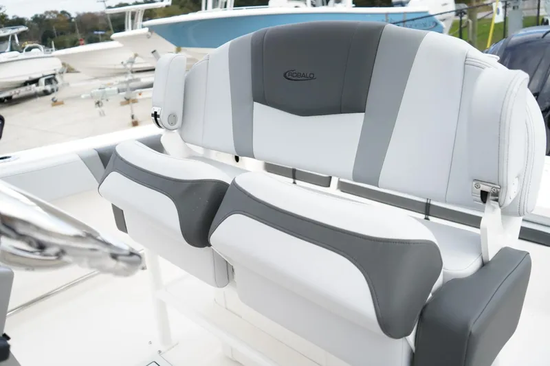 Slide: The Image of 2026 Robalo R232 Explorer boat seats in sleek gray and white design. - 4