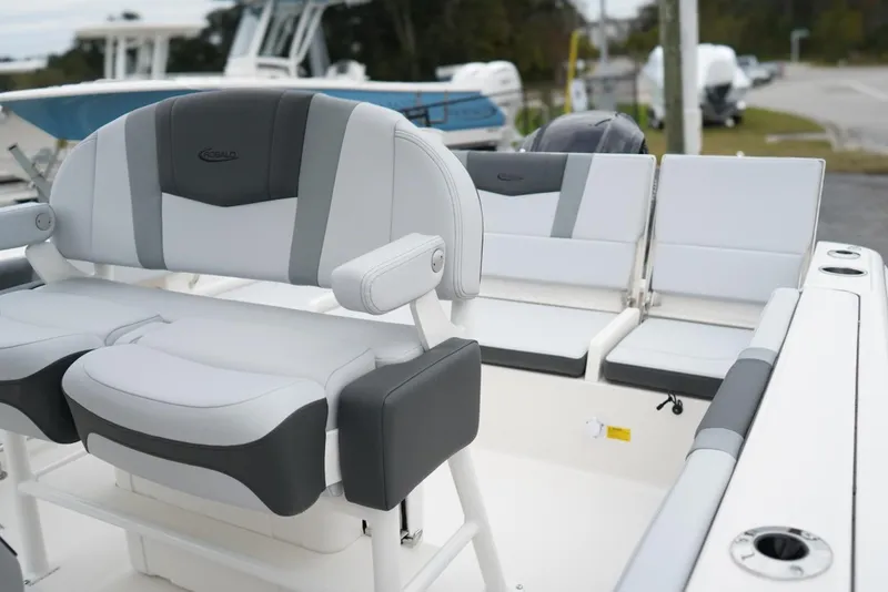 Slide: The Image of 2026 Robalo R232 Explorer boat interior with sleek, modern seating design. - 5