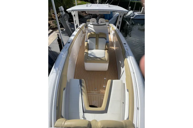 Slide: The Image of 2014 Powerplay Powerboats 35 Open with spacious seating and sleek design. - 22