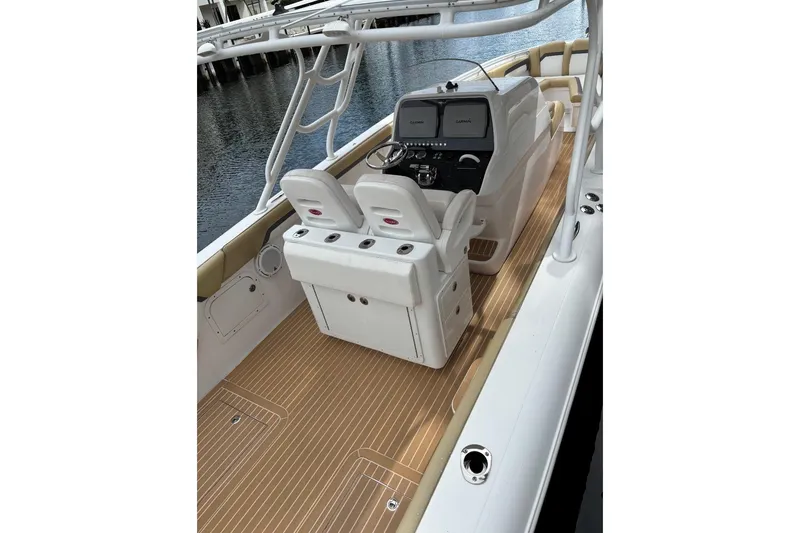 Slide: The Image of 2014 Powerplay Powerboats 35 Open cockpit with dual seats and navigation controls. - 5