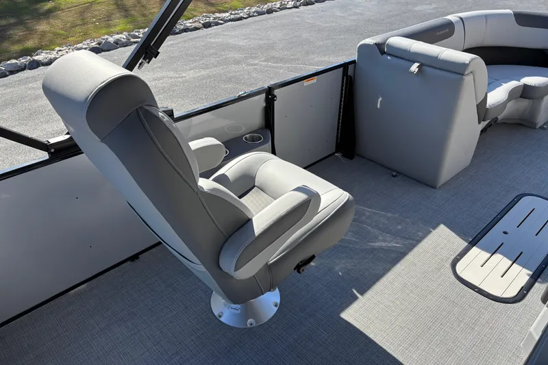 Slide: The Image of 2026 Veranda Relax VR 22 VLC boat interior with gray seating and flooring. - 10