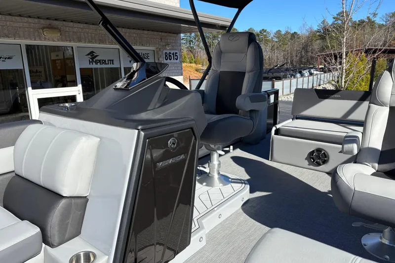 Slide: The Image of 2026 Veranda Relax VR 22 VLC pontoon boat interior with modern seating and helm. - 11