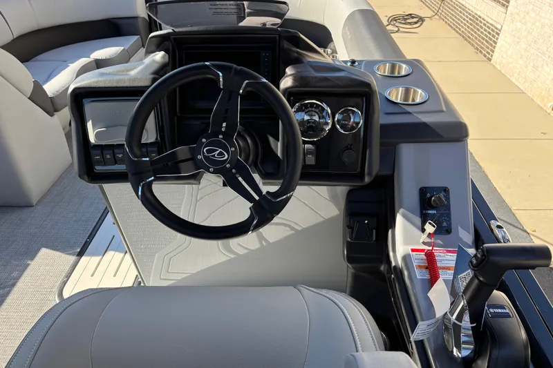 Slide: The Image of Steering console of 2026 Veranda Relax VR 22 VLC pontoon boat with modern controls. - 12