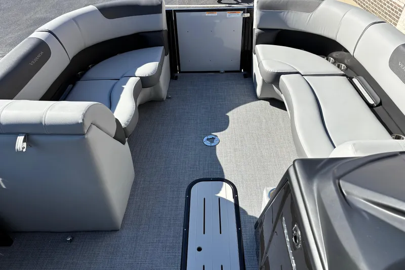 Slide: The Image of 2026 Veranda Relax VR 22 VLC pontoon boat interior with gray seating and flooring. - 13