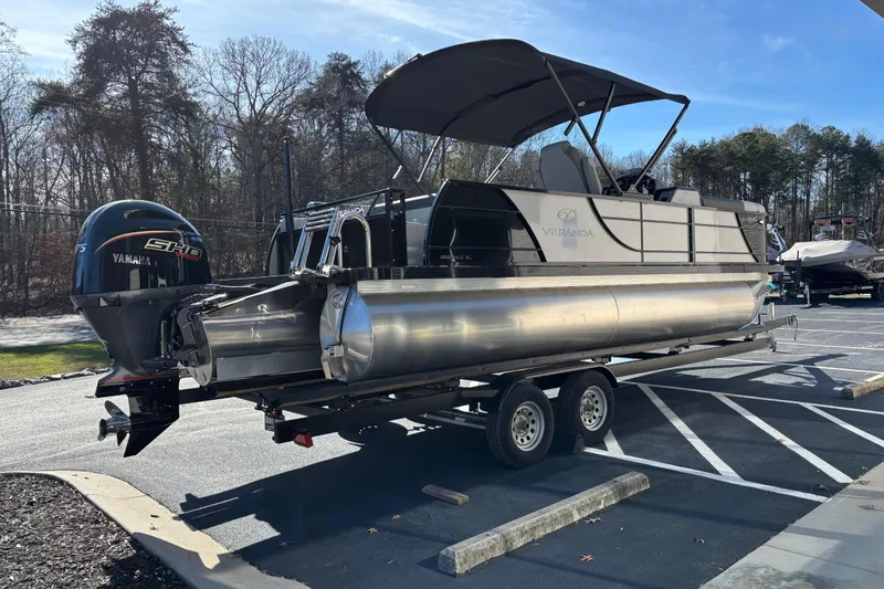 Slide: The Image of 2026 Veranda Relax VR 22 VLC pontoon boat on trailer, featuring Yamaha outboard motor. - 3