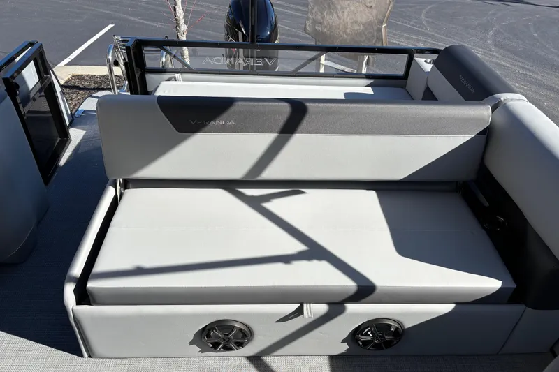 Slide: The Image of 2026 Veranda Relax VR 22 VLC boat interior with gray seating and speaker system. - 7