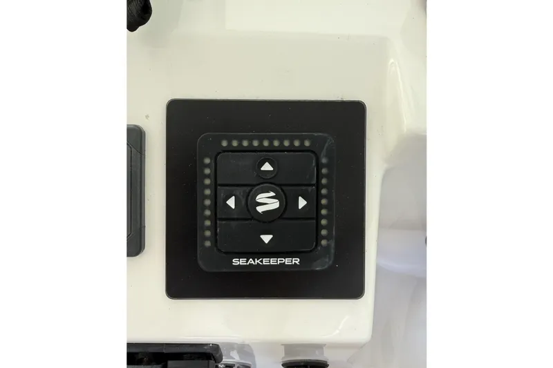 Slide: The Image of Seakeeper control panel on 2022 Back Cove 34O boat dashboard. - 7