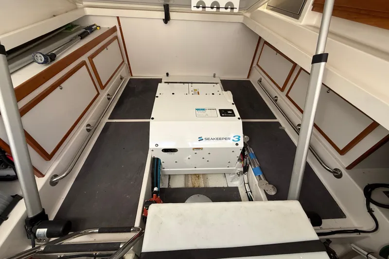 Slide: The Image of 2022 Back Cove 34O boat interior featuring Seakeeper 3 stabilizer system. - 9