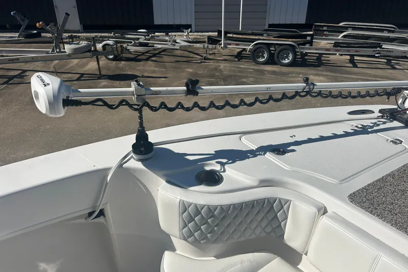 Slide: The Image of 2021 Twin Vee 260 VIVA boat interior with fishing rod holder and quilted seating. - 13