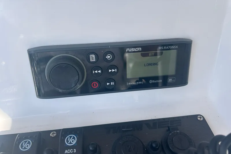 Slide: The Image of Fusion MS-RA70NSX stereo system on 2021 Twin Vee 260 VIVA boat dashboard. - 26