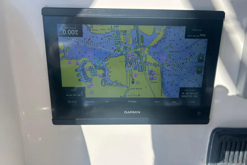 Slide: The Image of Garmin GPS display on 2021 Twin Vee 260 VIVA boat, showing nautical map. - 28