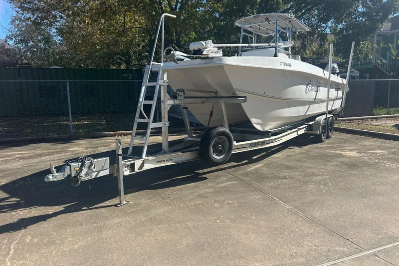 Slide: The Image of 2021 Twin Vee 260 VIVA boat on trailer in sunny outdoor setting. - 3