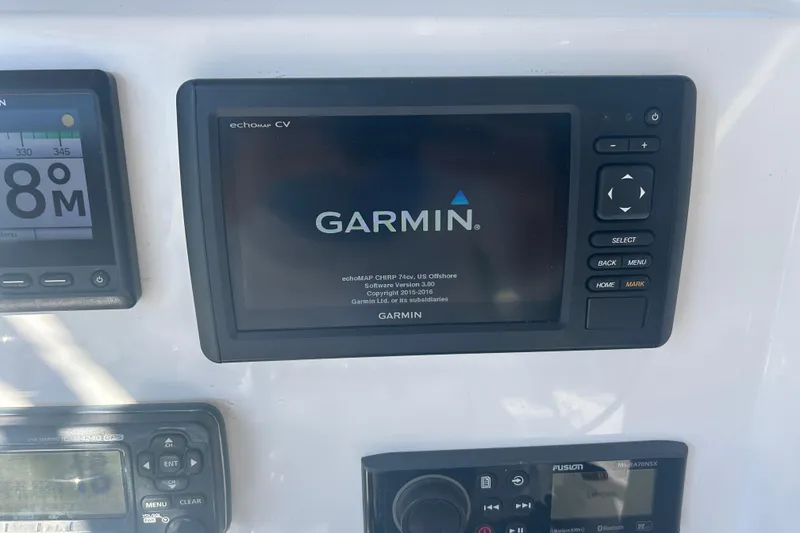 Slide: The Image of Garmin navigation system on 2021 Twin Vee 260 VIVA boat dashboard. - 31