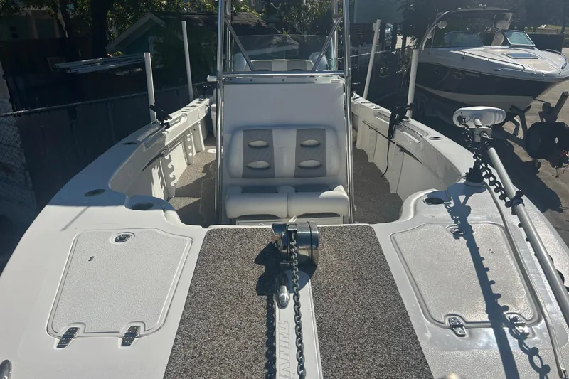 Slide: The Image of 2021 Twin Vee 260 VIVA boat interior with seating and deck features. - 5