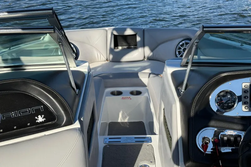 Slide: The Image of Interior view of a 2012 Centurion Enzo SV211 boat with dashboard and seating. - 13