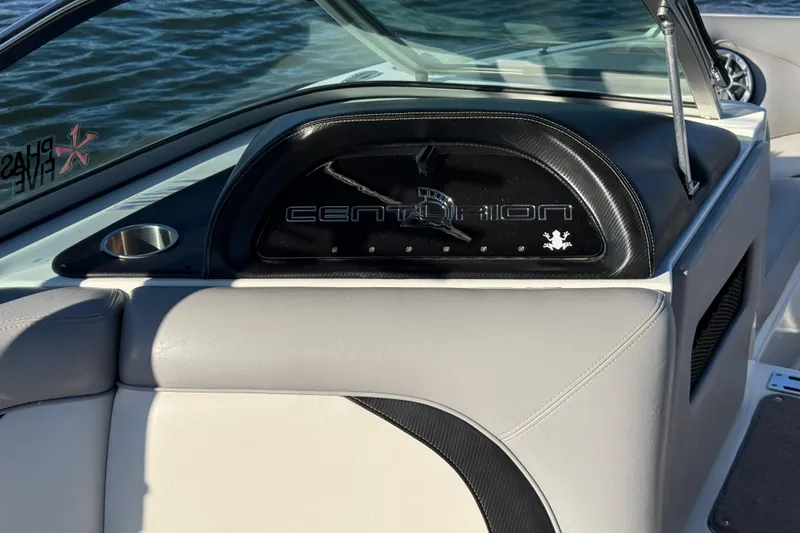 Slide: The Image of Interior of 2012 Centurion Enzo SV211 boat with logo and seating. - 15