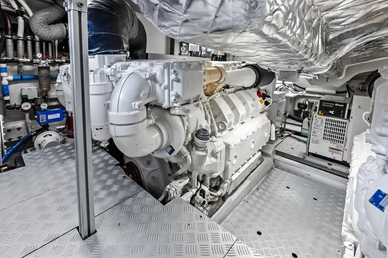 Slide: The Image of Engine room of 2021 Riva 56 Rivale yacht, showcasing advanced machinery and components. - 64