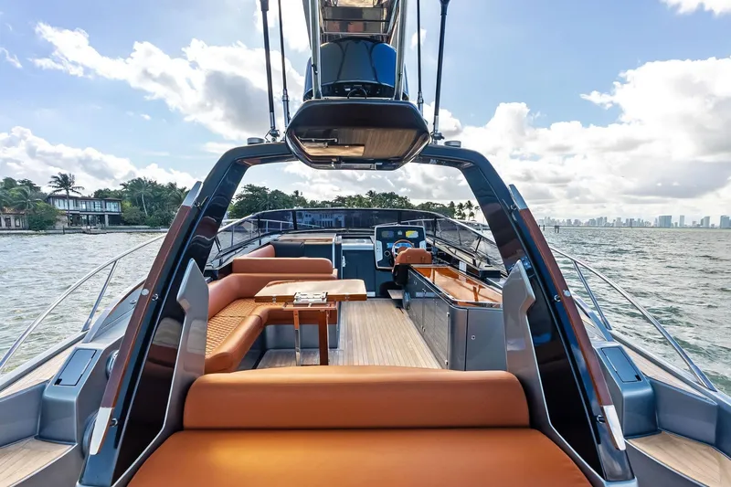 Slide: The Image of Luxurious 2021 Riva 56 Rivale yacht interior with elegant seating and ocean view. - 21