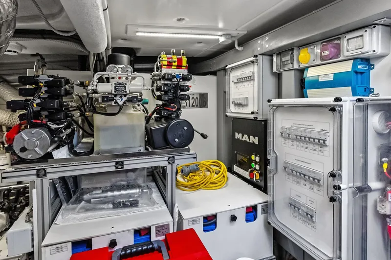 Slide: The Image of Engine room of 2021 Riva 56 RIVALE yacht, showcasing advanced machinery and control systems. - 66