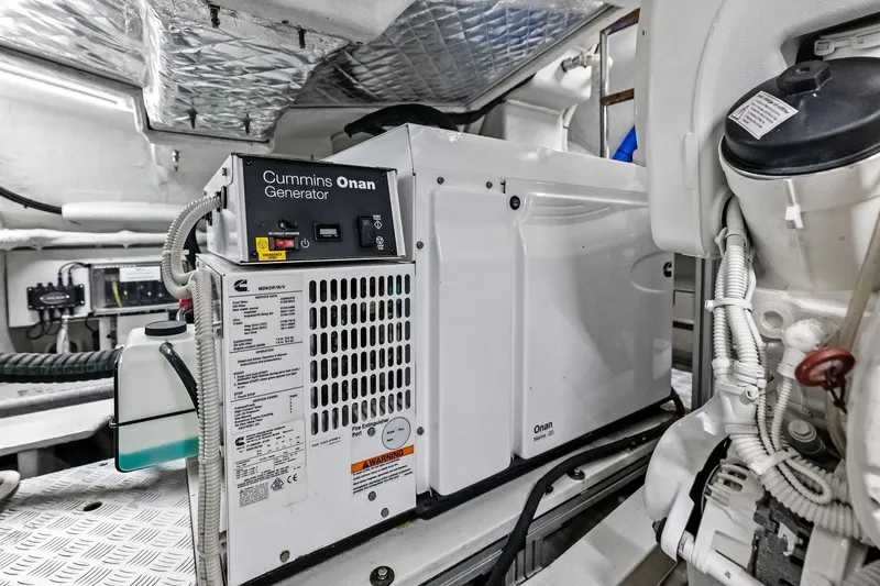 Slide: The Image of Engine room of 2021 Riva 56 Rivale featuring Cummins Onan generator. - 67