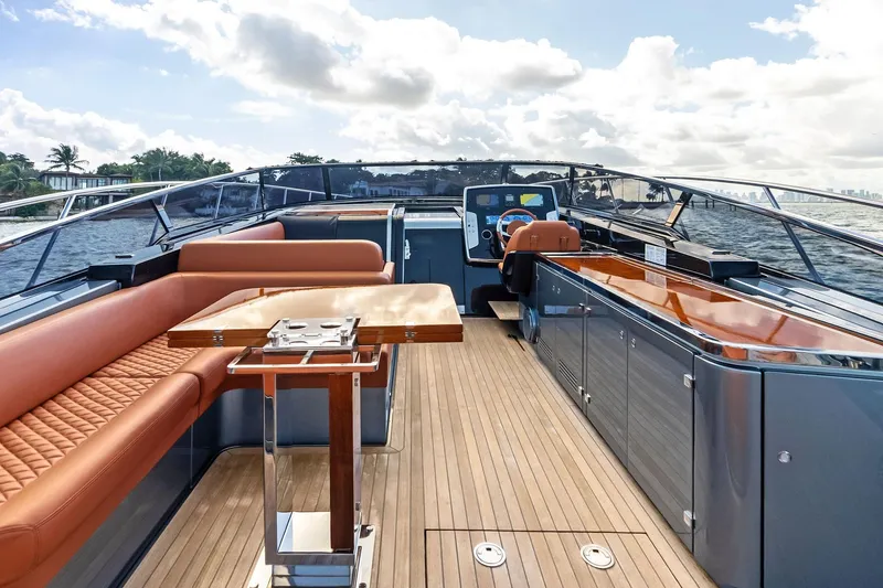 Slide: The Image of Luxurious 2021 Riva 56 Rivale yacht interior with elegant seating and modern helm. - 19