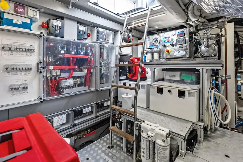 Slide: The Image of Engine room of 2021 Riva 56 Rivale yacht, showcasing advanced electrical systems and equipment. - 65