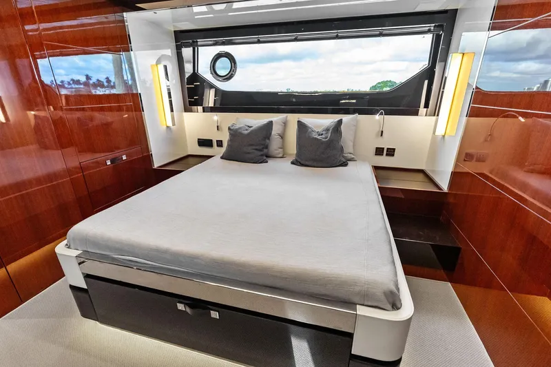 Slide: The Image of Luxurious bedroom interior of 2021 Riva 56 Rivale yacht with modern design and elegant finishes. - 56