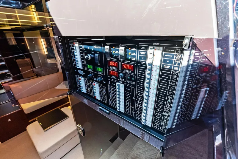 Slide: The Image of Control panel inside 2021 Riva 56 Rivale yacht, showcasing advanced navigation systems. - 45