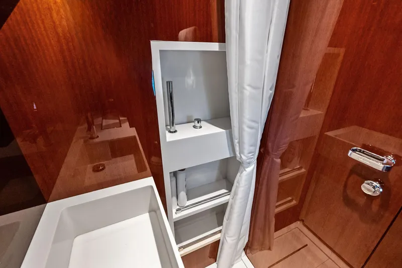 Slide: The Image of Luxurious bathroom interior of 2021 Riva 56 Rivale yacht with sleek wood finish. - 54
