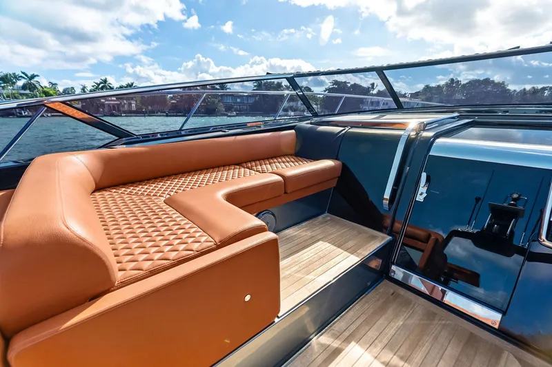 Slide: The Image of Luxurious 2021 Riva 56 Rivale yacht interior with elegant leather seating and sleek design. - 32