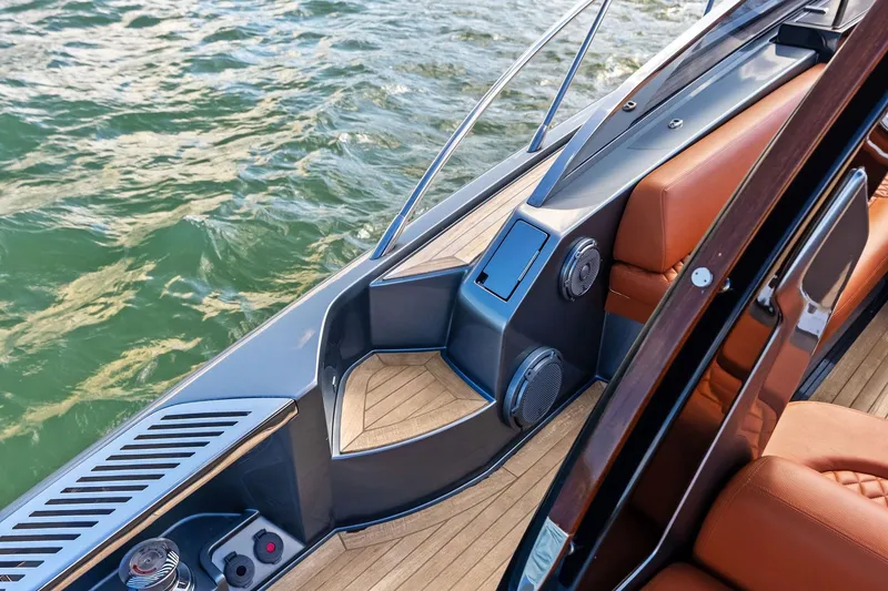 Slide: The Image of Luxury interior of 2021 Riva 56 Rivale yacht with leather seating and teak flooring. - 36
