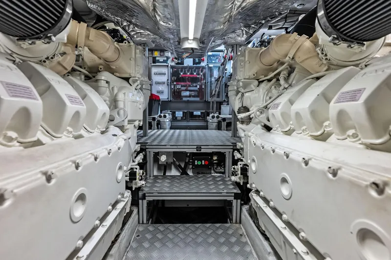 Slide: The Image of Engine room of 2021 Riva 56 RIVALE yacht, showcasing powerful machinery and equipment. - 69