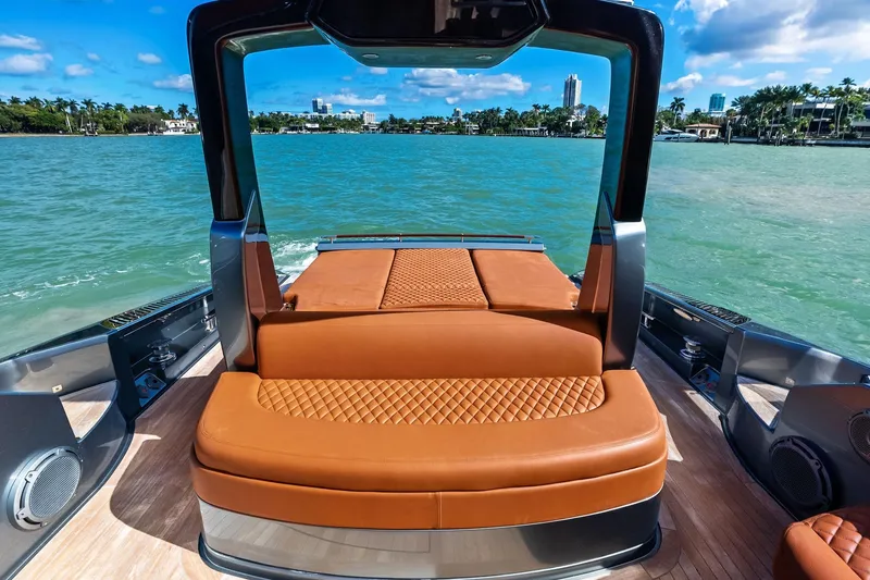 Slide: The Image of Luxurious 2021 Riva 56 Rivale yacht with elegant leather seating and scenic ocean view. - 25