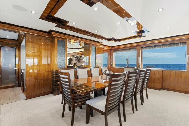 Slide: The Image of Luxurious dining area on 2013 Hargrave 125 Raised Pilothouse yacht with ocean view. - 12