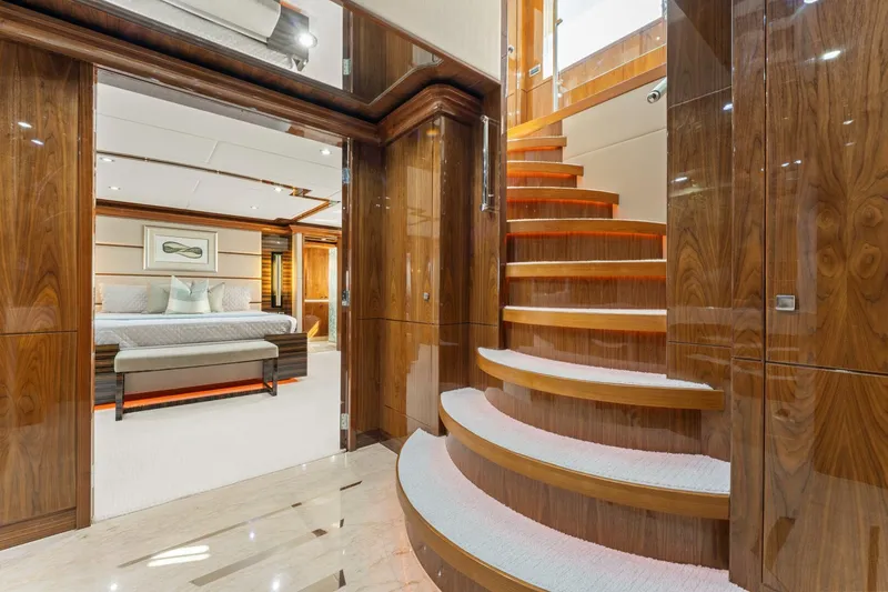 Slide: The Image of Luxurious interior of 2013 Hargrave 125 Raised Pilothouse yacht with elegant staircase and bedroom. - 29