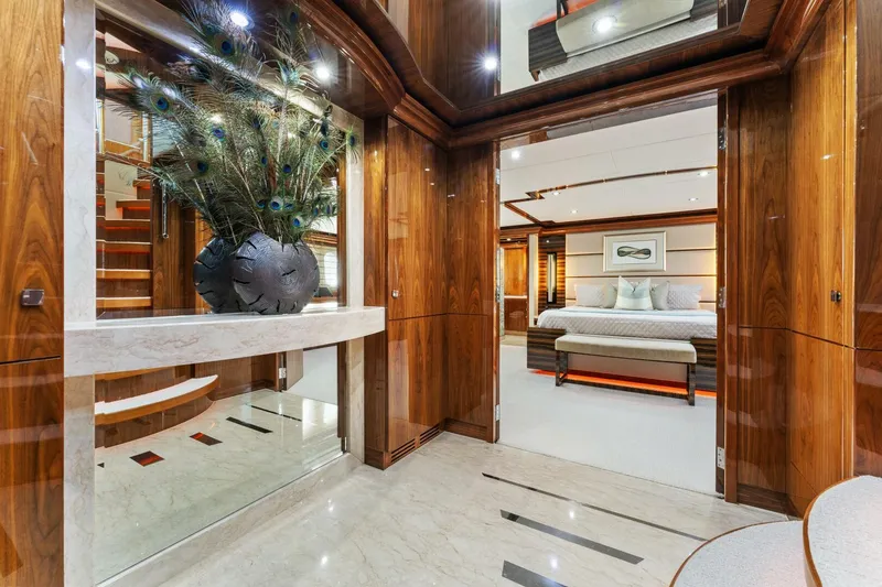 Slide: The Image of Luxurious interior of 2013 Hargrave 125 Raised Pilothouse yacht with elegant wood finishes and modern decor. - 30