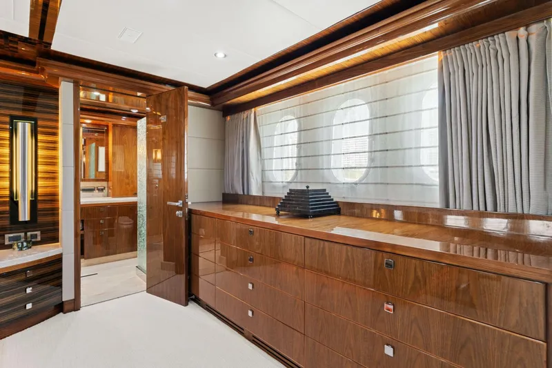 Slide: The Image of Luxurious interior of 2013 Hargrave 125 Raised Pilothouse yacht with elegant wood finishes. - 37