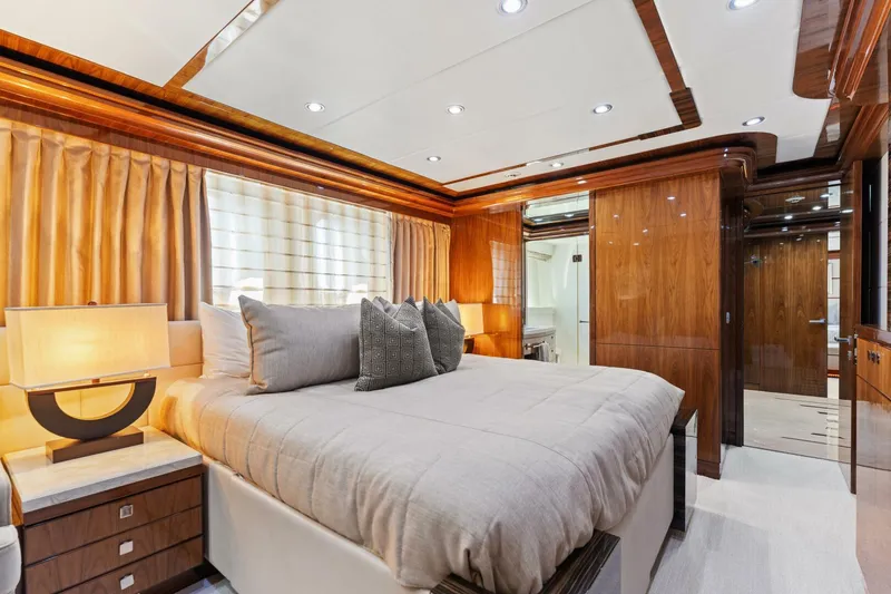 Slide: The Image of Luxurious bedroom interior of 2013 Hargrave 125 Raised Pilothouse yacht with elegant wood finishes. - 40