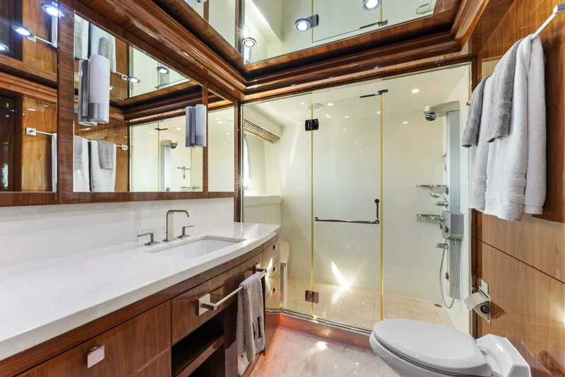 Slide: The Image of Luxurious bathroom in 2013 Hargrave 125 Raised Pilothouse yacht with modern fixtures and elegant design. - 43